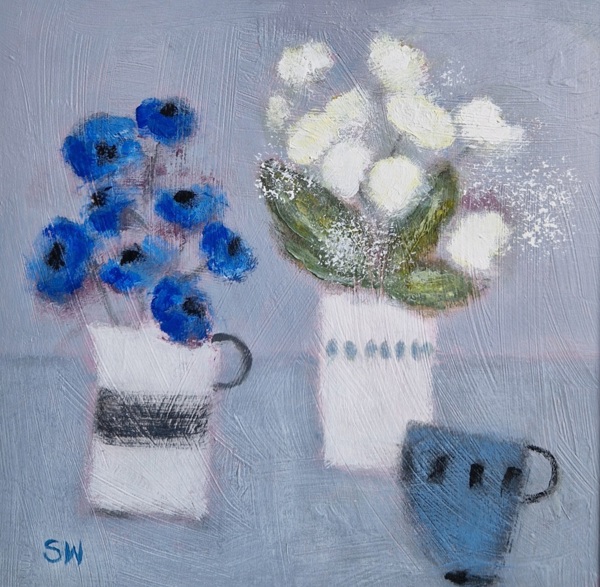 BLUE FLOWERS IN A STRIPED POT